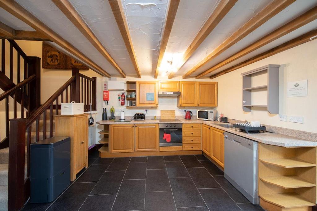 Kuchyň nebo kuchyňský kout v ubytování Lomas Cottage