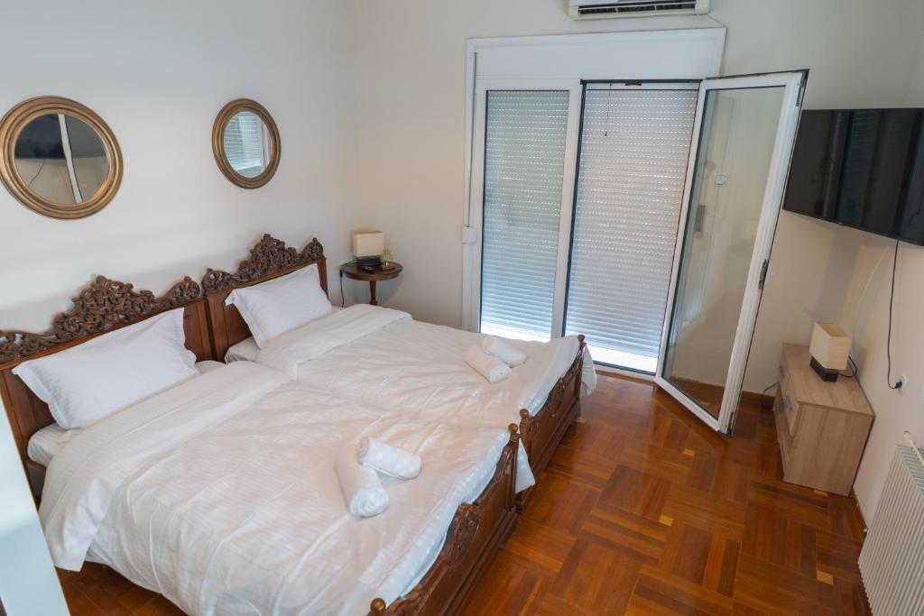 Posteľ alebo postele v izbe v ubytovaní Villa Beta Sea View