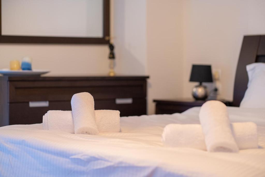 Posteľ alebo postele v izbe v ubytovaní Villa Beta Sea View