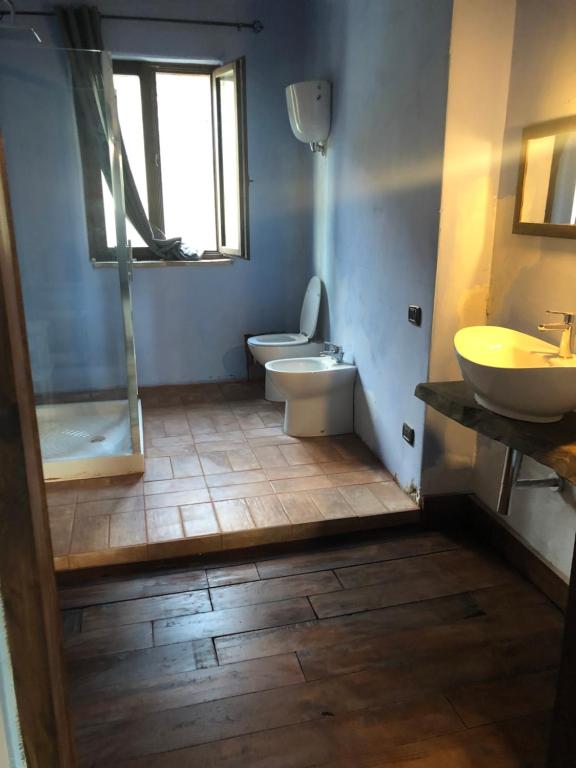 Koupelna v ubytování Agriturismo Il Covo del Solengo
