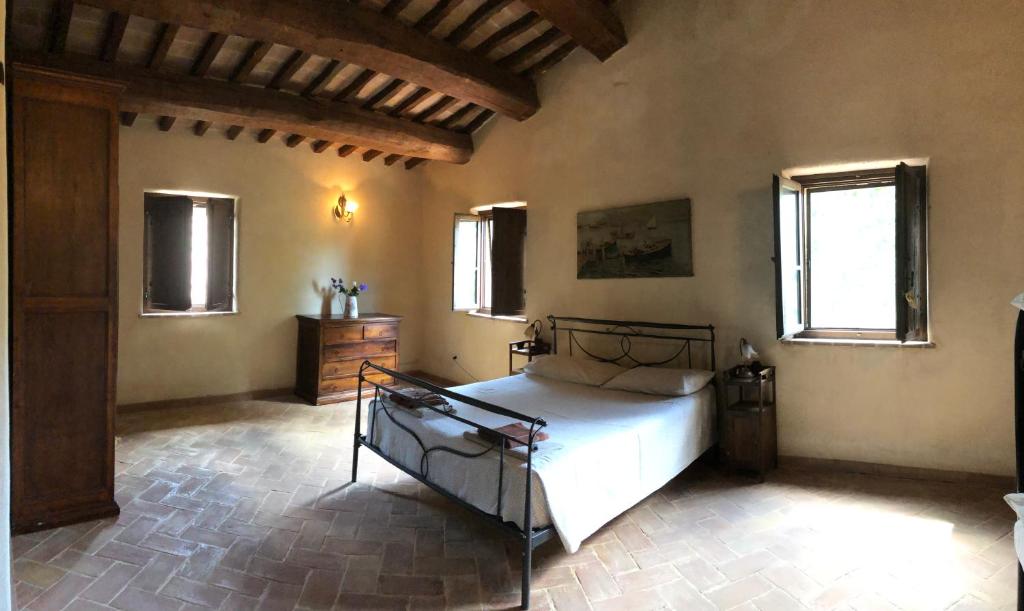 Postel nebo postele na pokoji v ubytování Agriturismo Il Covo del Solengo