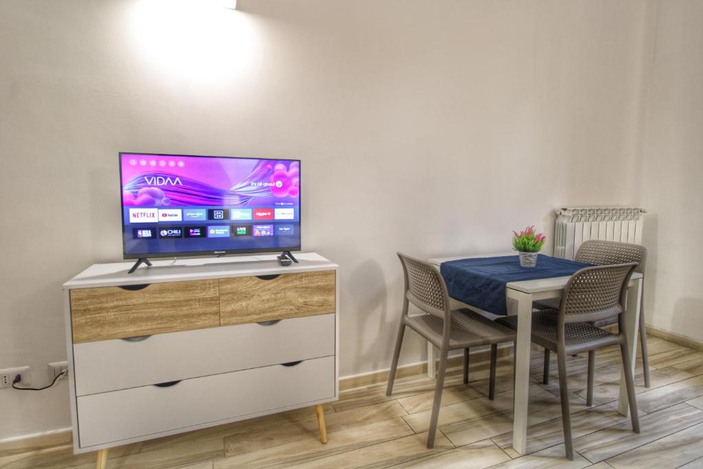 TV a/nebo společenská místnost v ubytování Dalmati House San Lorenzo