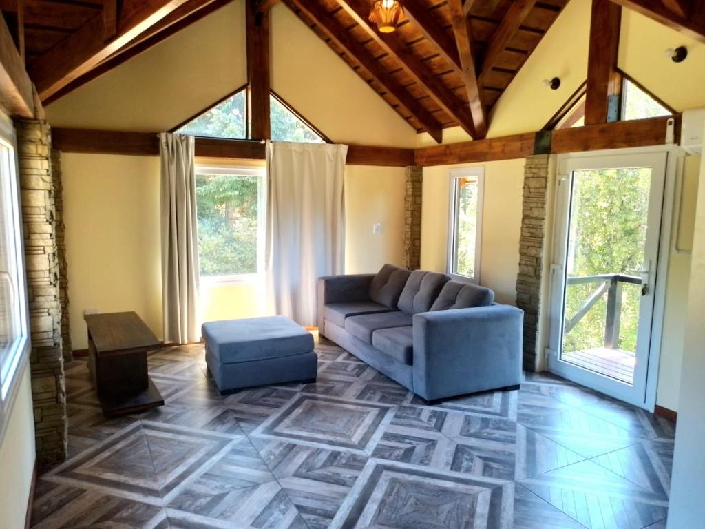 Posezení v ubytování Aparts chalet Alquimia