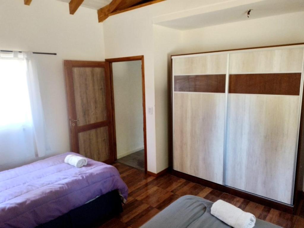 Postel nebo postele na pokoji v ubytování Aparts chalet Alquimia