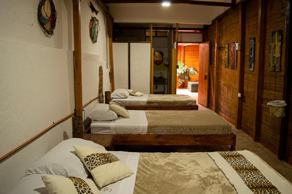 Postel nebo postele na pokoji v ubytování Refugio del Jaguar