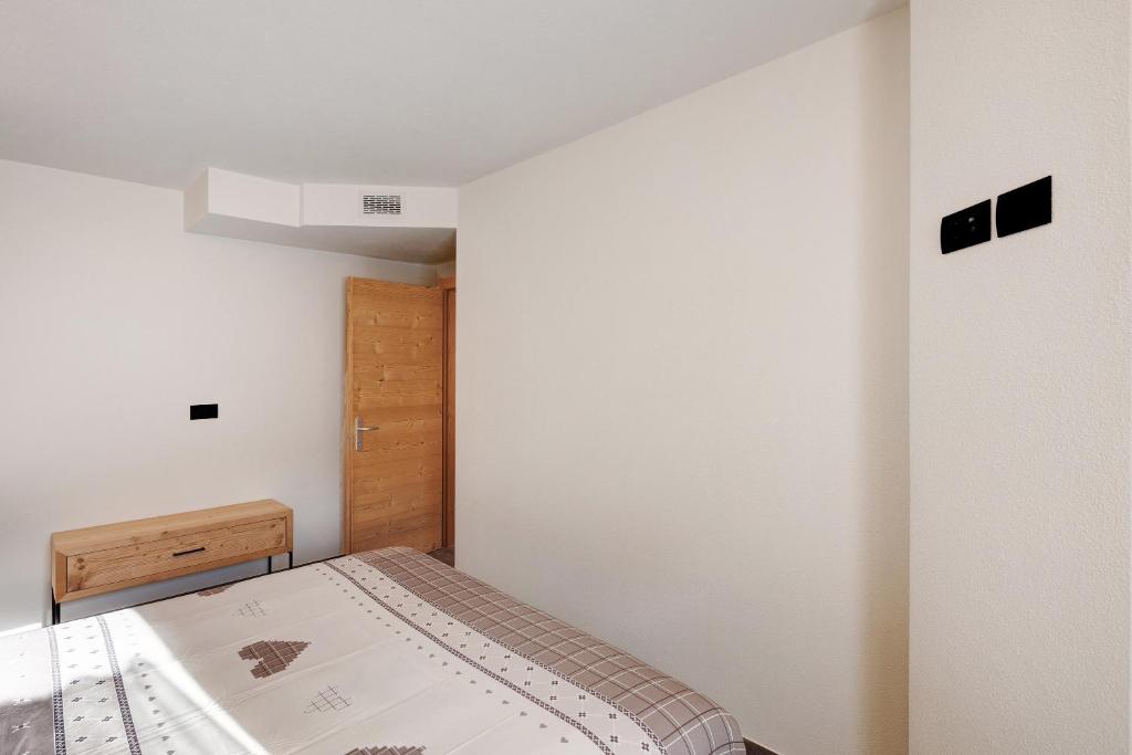 Posteľ alebo postele v izbe v ubytovaní Petalo Rosina's Home
