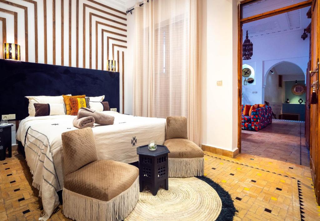 Postel nebo postele na pokoji v ubytování Riad La Croix Berbere Deluxe