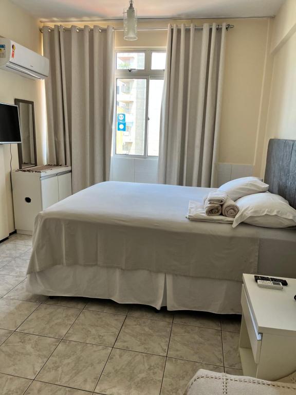 Postel nebo postele na pokoji v ubytování Stúdio Beira Mar