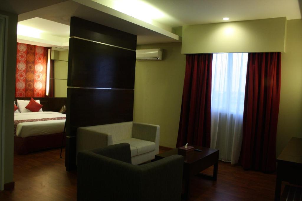 Postel nebo postele na pokoji v ubytování Pose In Hotel Solo