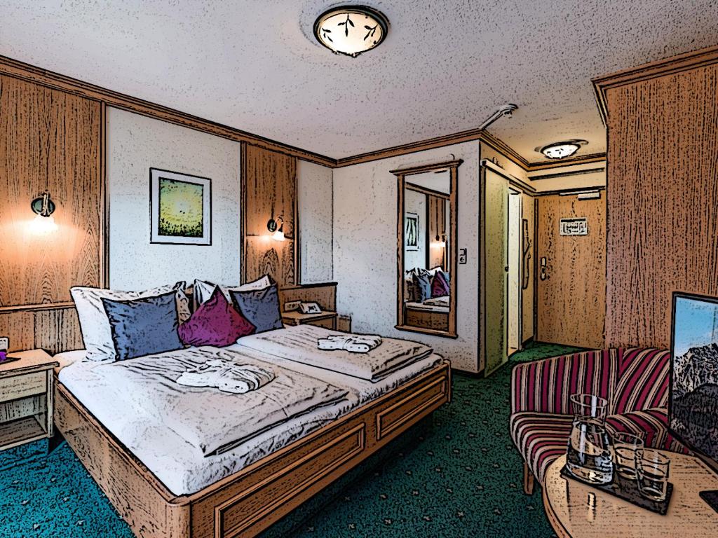 Postel nebo postele na pokoji v ubytování Hotel Crystal - KitzHorn Suites