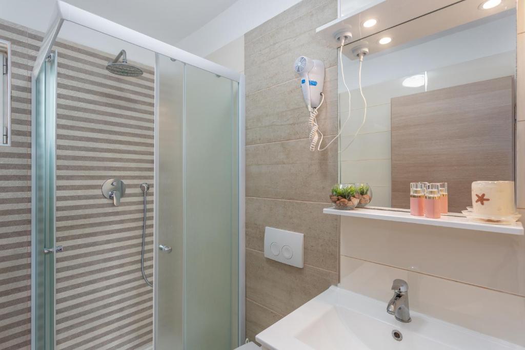 Kúpeľňa v ubytovaní Apartmani Gabi