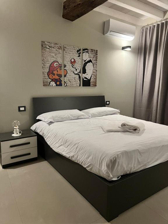 Postel nebo postele na pokoji v ubytování V&B Suites and Apartments