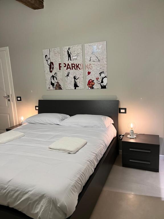 Postel nebo postele na pokoji v ubytování V&B Suites and Apartments