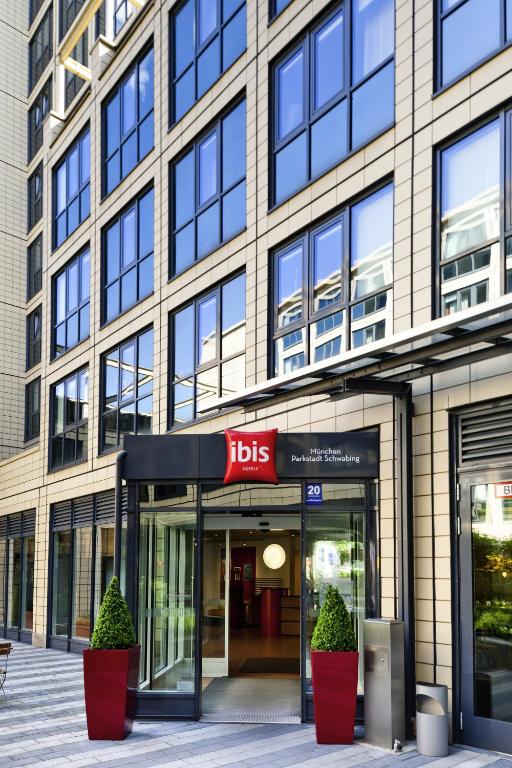 a building with a ups sign in front of it at ibis München Parkstadt Schwabing in Munich