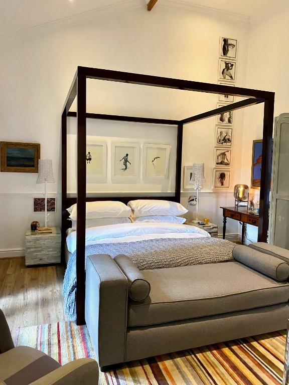 Postel nebo postele na pokoji v ubytování 1 Royal Street Guesthouse
