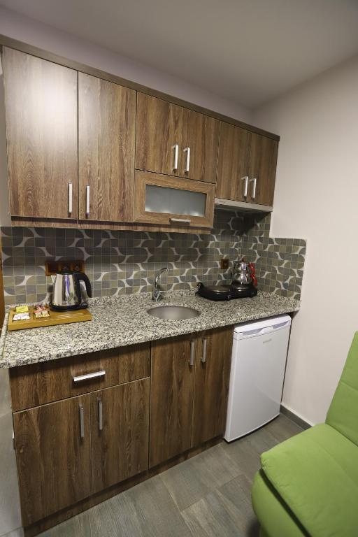 Kuchyň nebo kuchyňský kout v ubytování Dolphin Apart Hotel