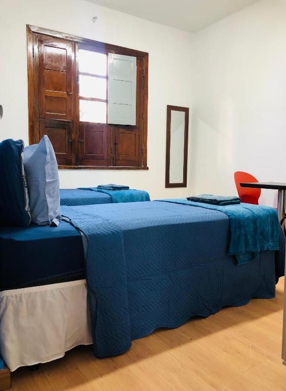 Postel nebo postele na pokoji v ubytování Rota BH Hostel