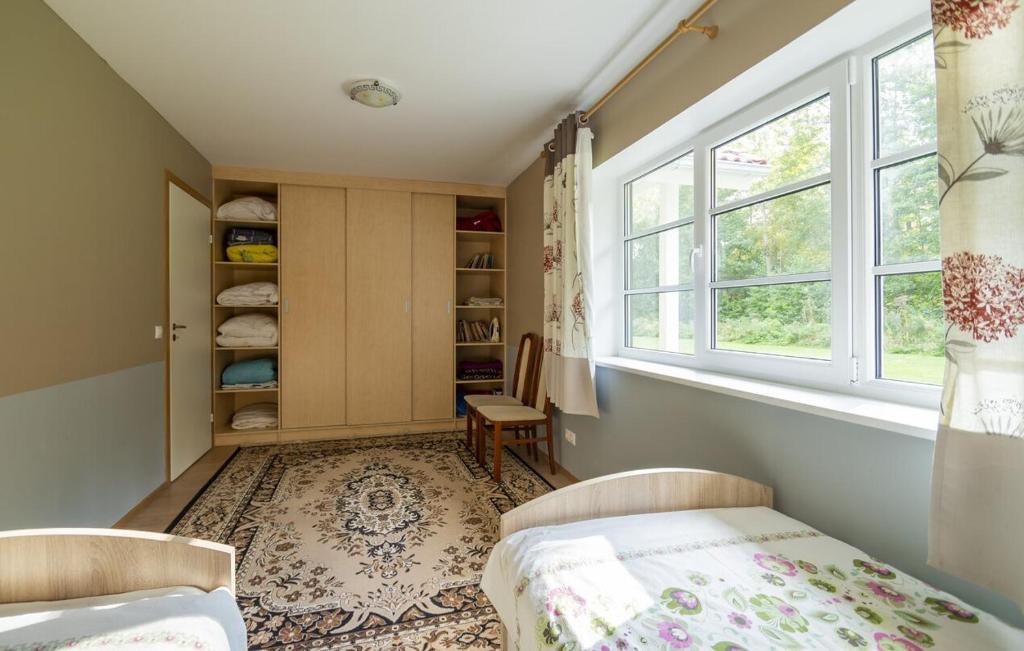 Postel nebo postele na pokoji v ubytování Ninnujärve Private Holiday Home