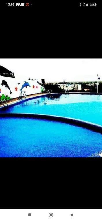 Kolam renang di atau dekat dengan Studio avec piscine de luxe cabo negro