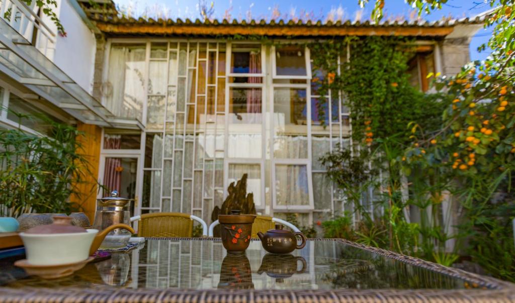 Un jardín fuera de Honglin Houseg虹林的小院 防疫整栋 古城里温馨私家小院 享受大理慢时光 树下喝茶聊天 烧烤娱乐自助厨房 休闲好去处