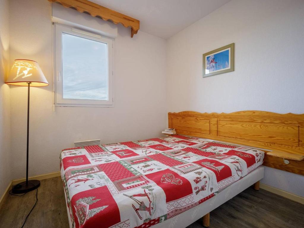 Posteľ alebo postele v izbe v ubytovaní Grand appartement 12 pers. à Peyragudes avec balcon - FR-1-695-8