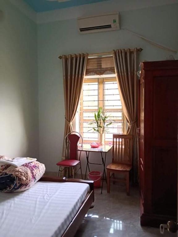 Postel nebo postele na pokoji v ubytování Hải Phận Homestay