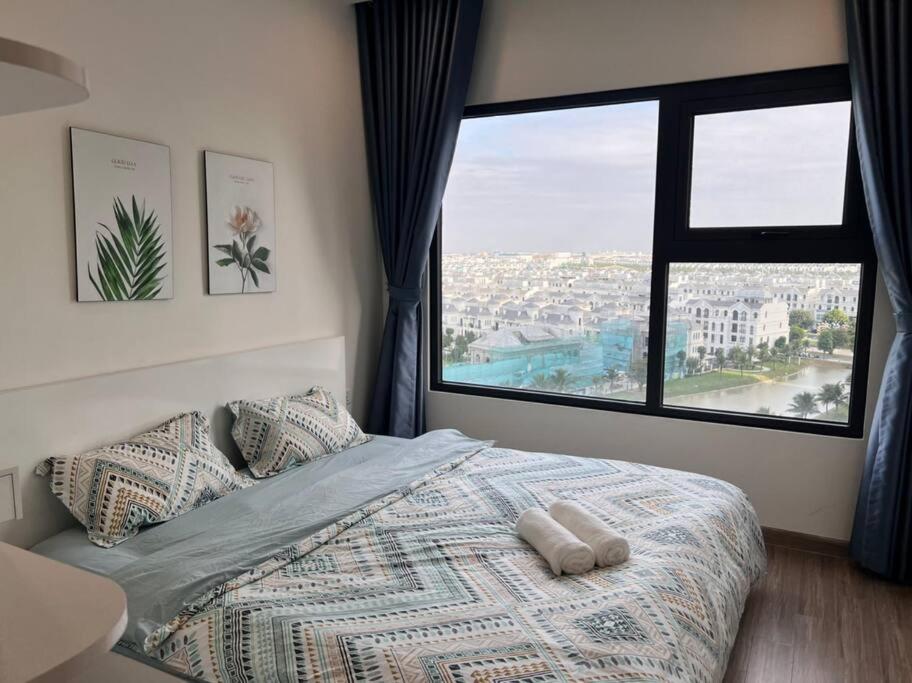 Katil atau katil-katil dalam bilik di căn hộ 1 ngủ có 2 giường, view hồ