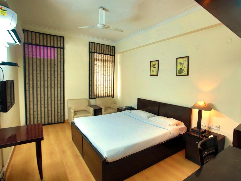 Postel nebo postele na pokoji v ubytování New Delhi YMCA Tourist Hostel