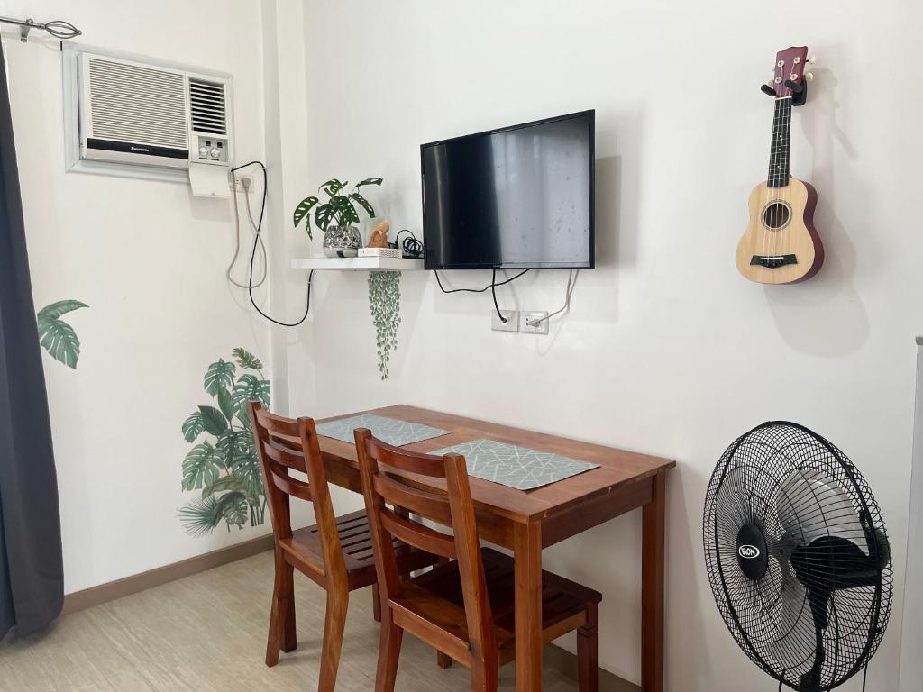 TV a/nebo společenská místnost v ubytování Alaia Studios