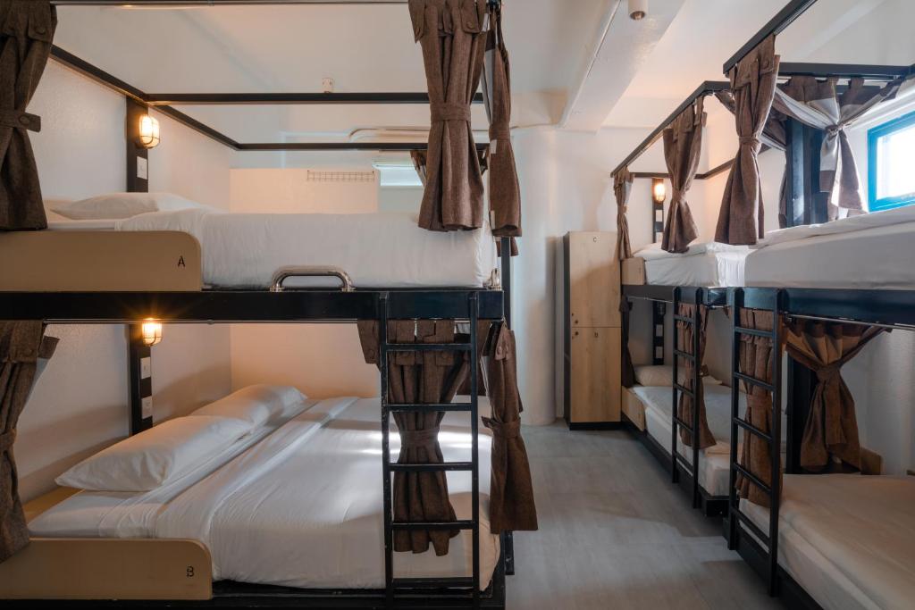 Postel nebo postele na pokoji v ubytování Hop Hostel