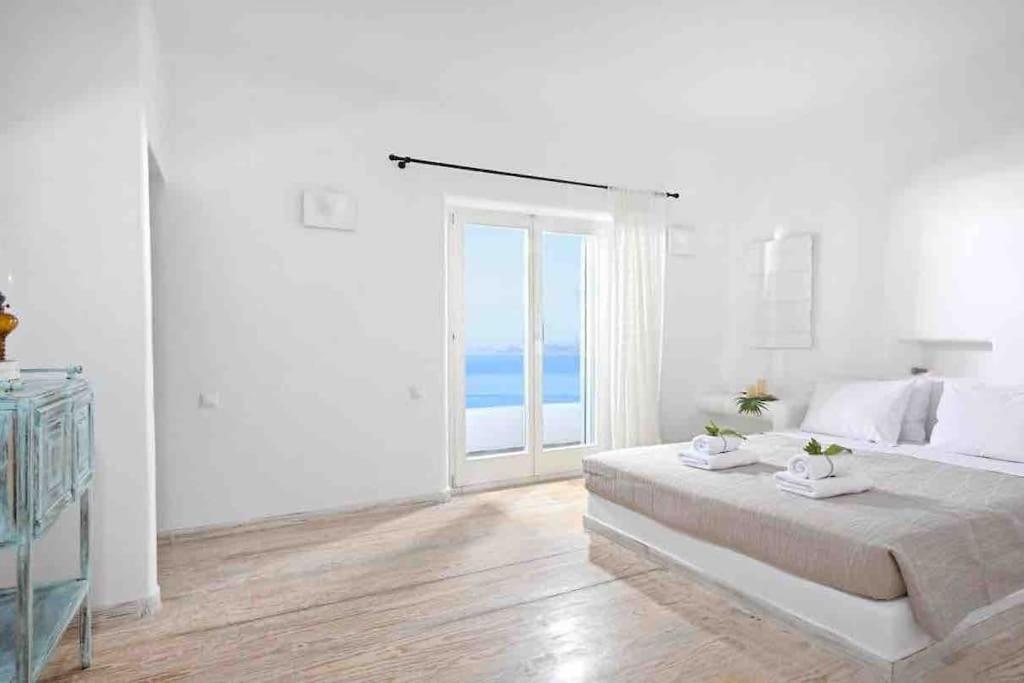 Postel nebo postele na pokoji v ubytování Villa Navona Mykonos