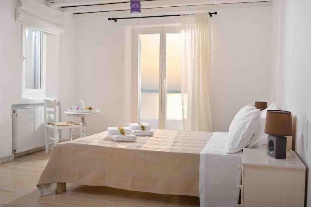 Postel nebo postele na pokoji v ubytování Villa Navona Mykonos