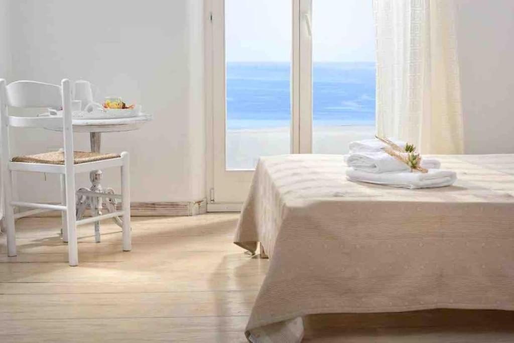 Postel nebo postele na pokoji v ubytování Villa Navona Mykonos