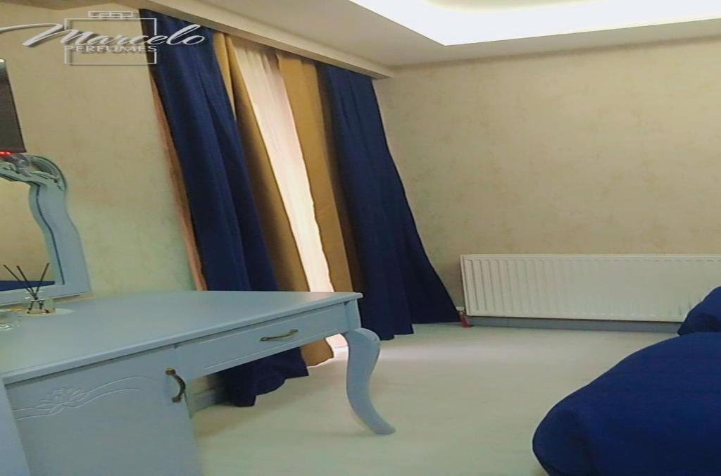 Postel nebo postele na pokoji v ubytování BALPETEK HOTEL