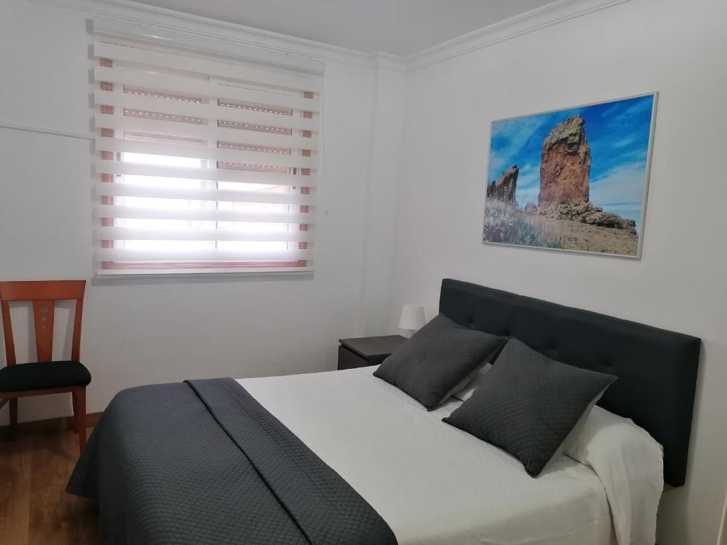 A bed or beds in a room at Apartamento mirador del Mar