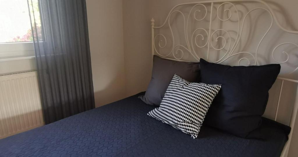 Postel nebo postele na pokoji v ubytování Ferienwohnung Frieda, Merzig