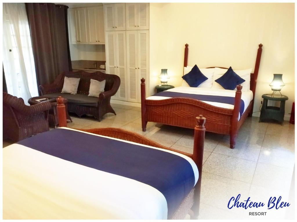 Postel nebo postele na pokoji v ubytování Chateau Bleu Resort