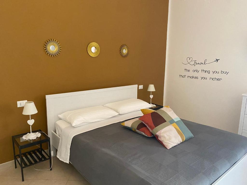 Postel nebo postele na pokoji v ubytování Nenetta Rooms & Suites Monopoli