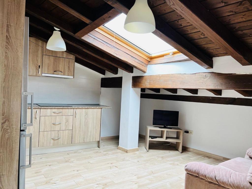TV a/nebo společenská místnost v ubytování Apartamentos Raíces