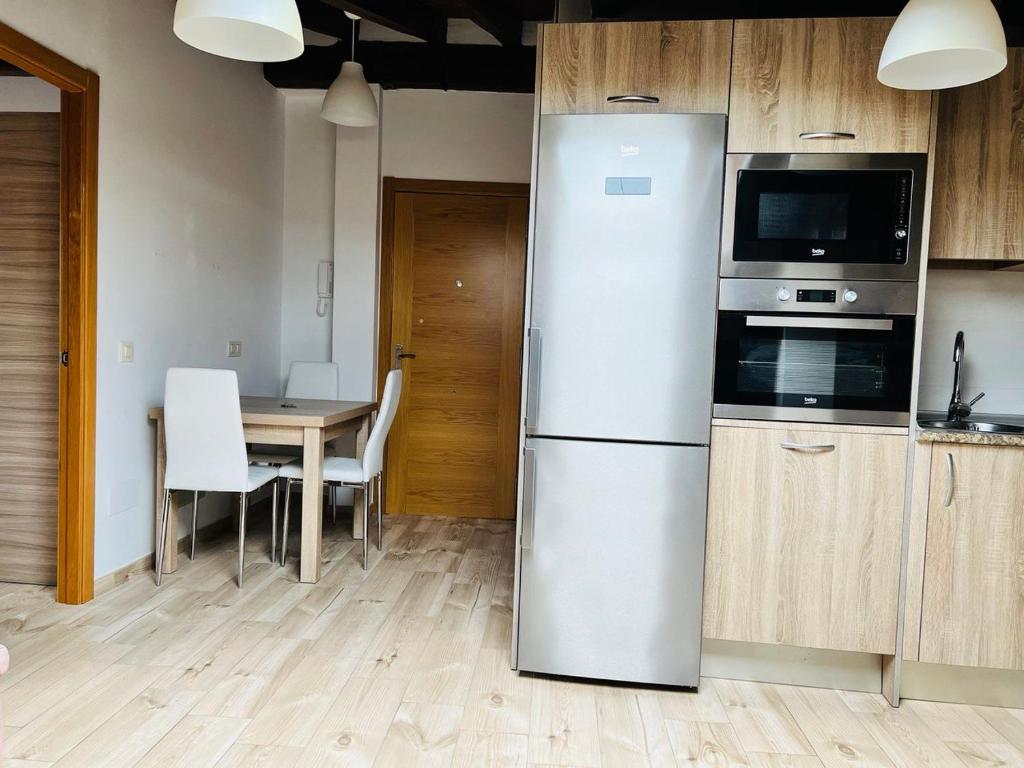 Kuchyň nebo kuchyňský kout v ubytování Apartamentos Raíces
