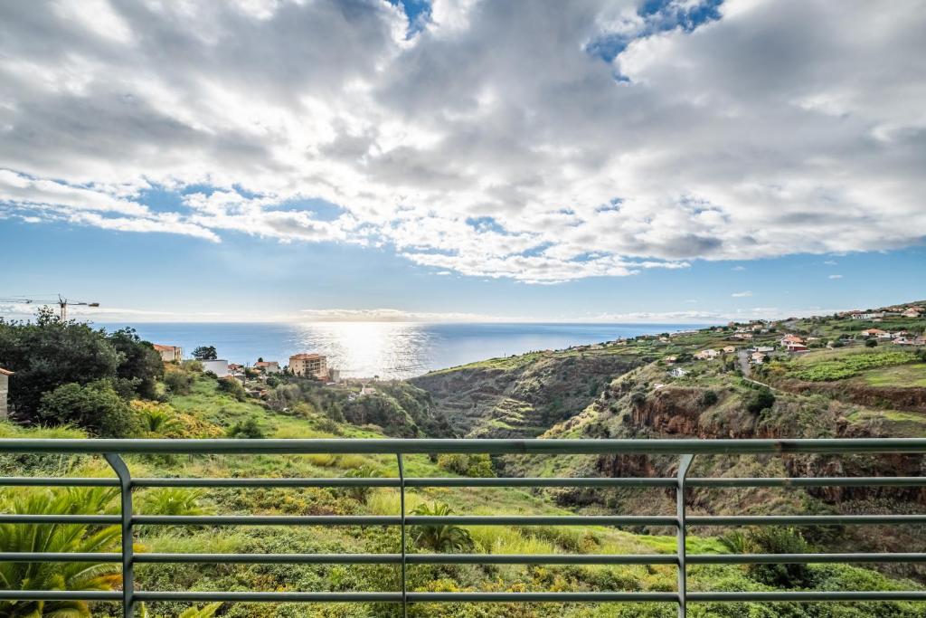 a view of the ocean from a hill at Bela Vista Sea View in Venda do Atalhinho