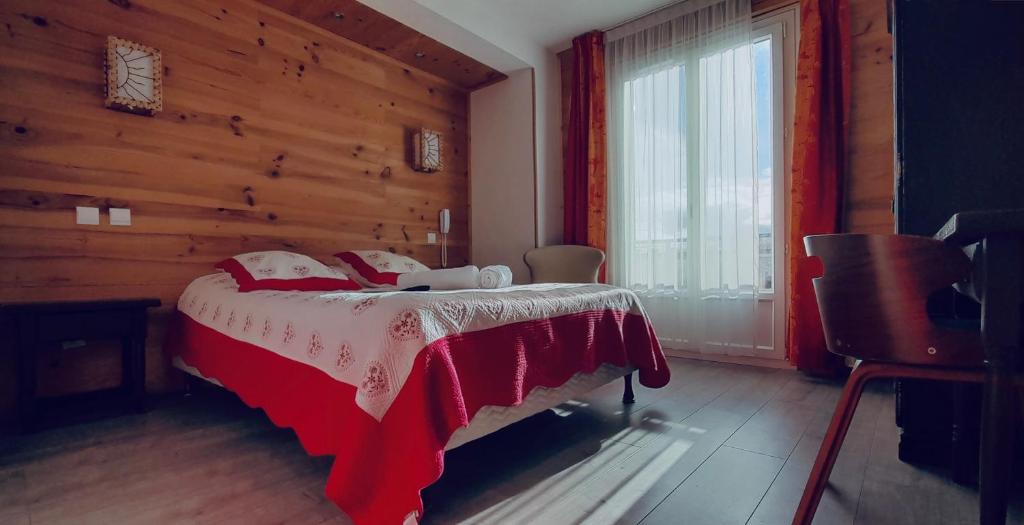 Postel nebo postele na pokoji v ubytování Hôtel Bel Angle