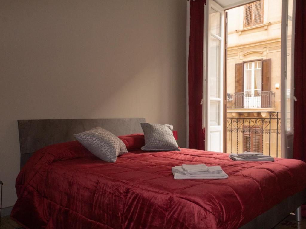 Кровать или кровати в номере Pacini Deluxe Apartment