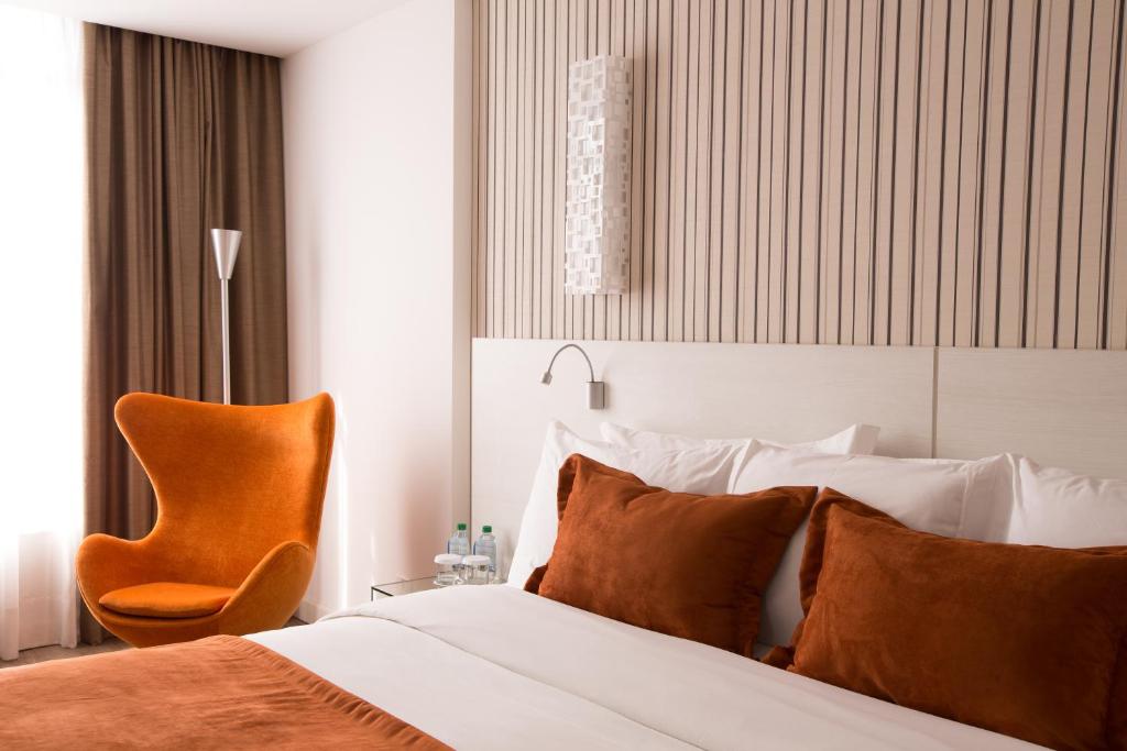 Postel nebo postele na pokoji v ubytování Radisson Hotel Curitiba