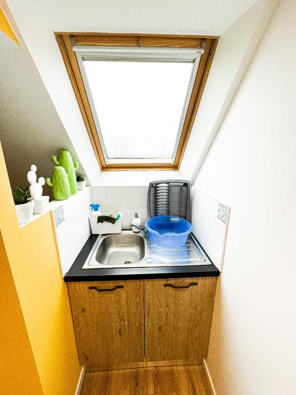 Kuchyň nebo kuchyňský kout v ubytování CHAMBRE APPARTEMENT