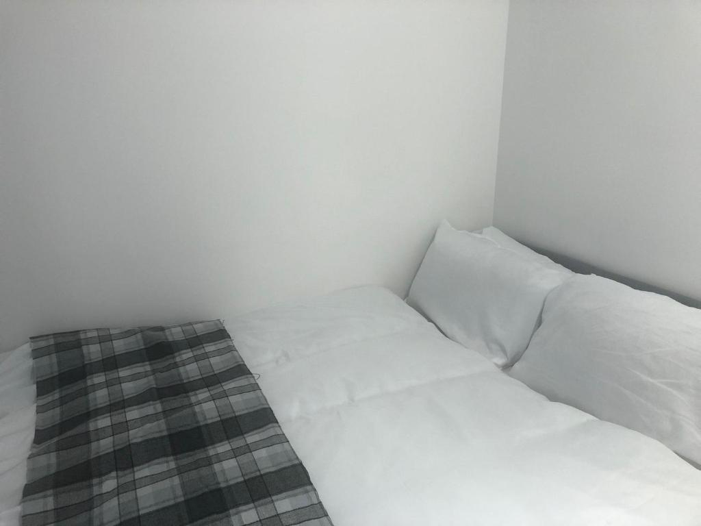 Postel nebo postele na pokoji v ubytování Macpherson House