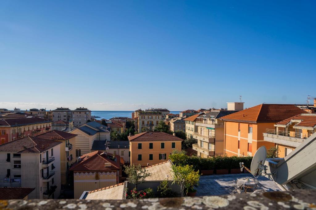 a view of a city from the roof of a building at 083 - Casa Grande con Attico condominiale vista mare, 500 metri dalla spiaggia in Chiavari