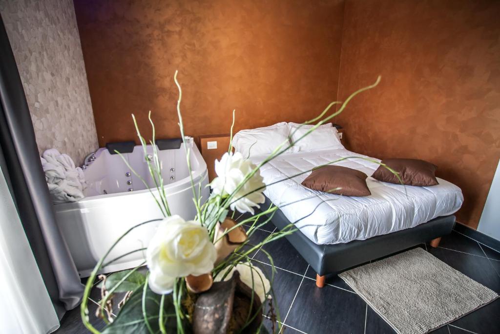 Postel nebo postele na pokoji v ubytování Hotel Oceanomare