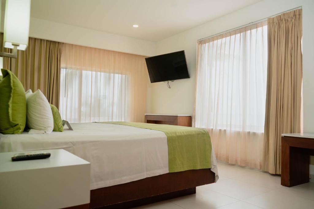 Postel nebo postele na pokoji v ubytování Cancun Bay All Inclusive Hotel