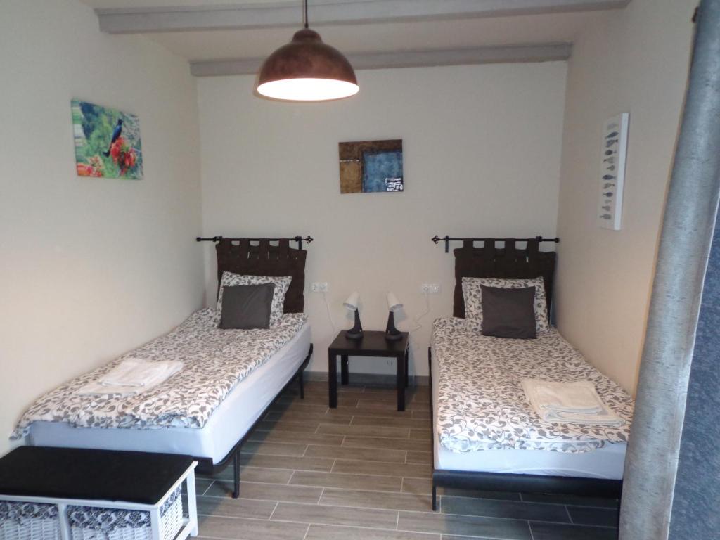 Postel nebo postele na pokoji v ubytování Melody Huis